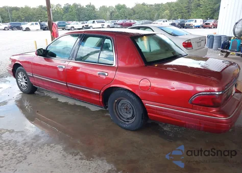 1997 Mercury Grand Marquis Gs z USA, uszkodzony, nr VIN 2MELM74W0VX665187